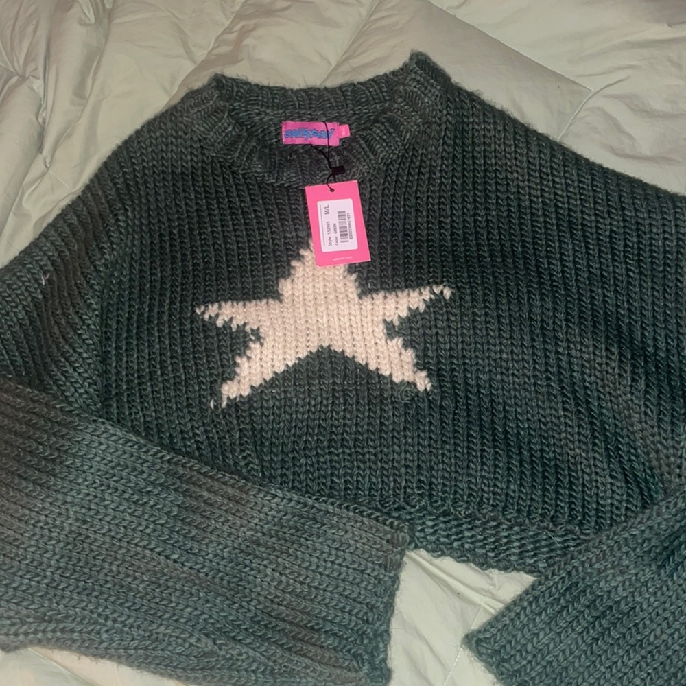 This is a brand new with tags Edikted sweater.